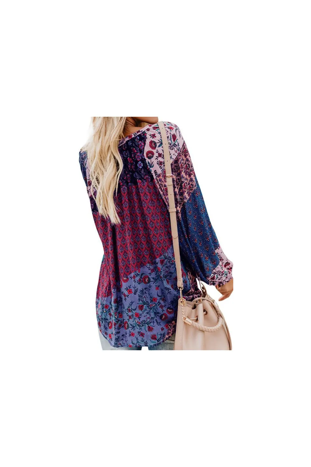 Blusa morada con estampado floral