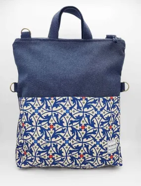 Bolso-mochila azul con bolsillo modernista