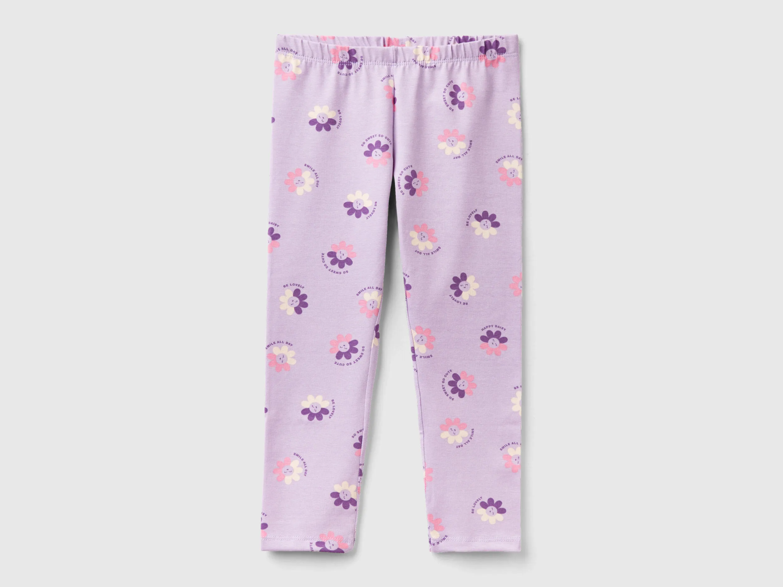 Leggings lila con estampado floral