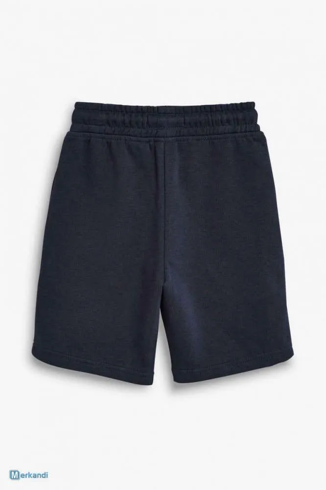 Pantalones cortos de lana para niños Próximo estilo Suave trote Pantalones cortos de verano lisos