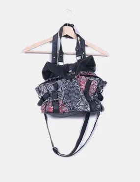 Smash! Bolso satchels negro combinado con estampado floral