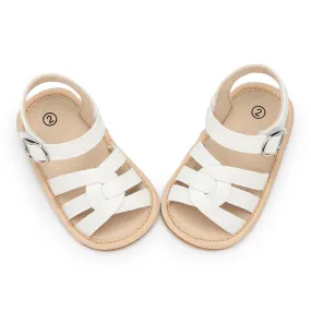 Zapatos de bebé Sandalias infantiles de cuero Goma plana antideslizante Suela suave Niña niña Primeros caminantes Zapatos de cun